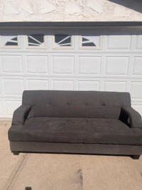  Sofa bed reclines into a bed for sale 