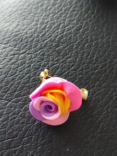 Handmade clay rose pin/brooch with green leaf.