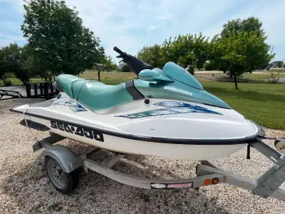 Rotax Engine, Brand new battery, Includes Aluminum Trailer, Reverse, 3 seater, Can pull tubes, 2 Str...