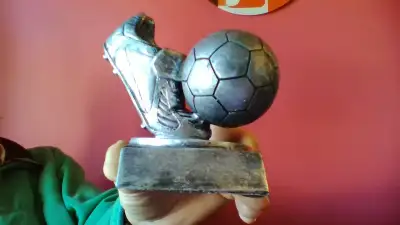 This started off as a soccer trophy but the face plate has been removed so now it makes a nice shelf...