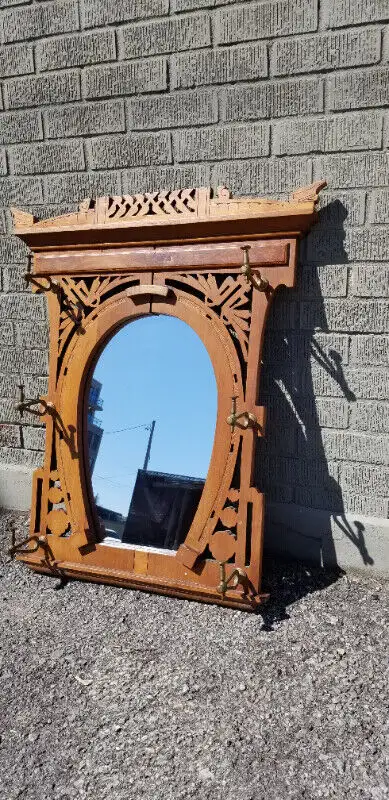 Victorian wood coat rack w horseshoe mirror metal hooks c1890, View more