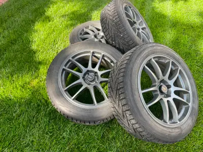 4- Nokian Hakkapeliitta R2 winter tires 235/55R19 and RSSW rims with locknuts off Dodge less than 20...