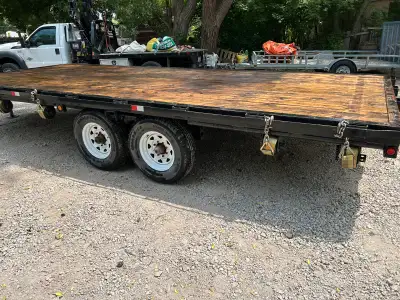 Deck over trailer, 8' w by 20' long. Heavy double axle, 14000 lb capacity. Pintle hitch, like new ba...