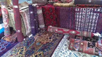 Welcome to the 2025 Christmas Market. Sell & repair handmade rugs. All Rugs Are On Sale. Handmade Pe...