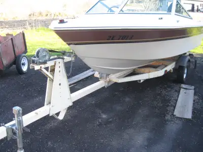15 FT. THUNDERCRAFT BOAT WITH 85 HP MERCURY MOTOR AND TRAILER THE BOAT NEEDS WIRING HOOK UP. $1800 C...