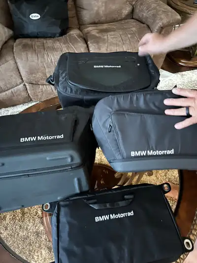 All original BMW saddlebags and cover for K1600GTL also includes service manual