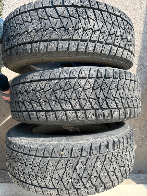225/65R17 Blizzak DM-V2 winter tires for sale set of 3 tires in Tires & Rims in Calgary