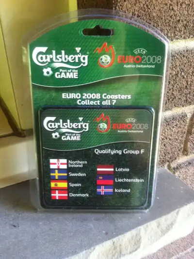 This is a new in the package Euro Cup 2008 / Carlsberg wooden coaster representing the 7 teams in Gr...