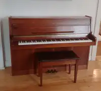Piano droit en excellente condition