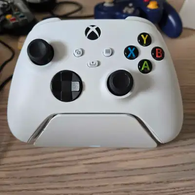 Xbox razer quickcharging stand.  Controller optional, View more