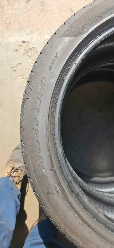 I'm selling a used Pirelli P Zero tire, sized 255/40ZR19 96Y, perfect for high-performance vehicles....