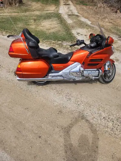Perfect condition. Trailer hitch, heated grips, new battery, rack, wired for heated vest and other d...