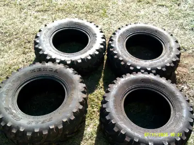 Two sets of ATV tires both 25 8-12 front and 25 10-12 rear. Kenda Bear Claw and Carlisle. Both sets...