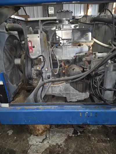 Zamboni engine and hydraulics hydrostatic trans hydrolic oil tank and drive motor was propane and sw...