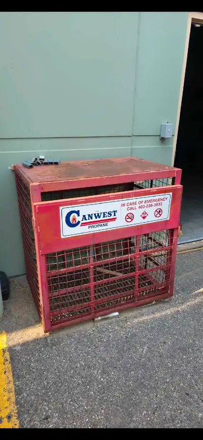 This is a Canwest Propane or gas storage container, ideal for secure outdoor storage. Being sold in...