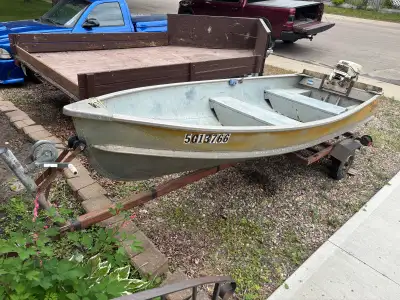 12 ft aluminum boat with traiier and 25 hp Johnson motor