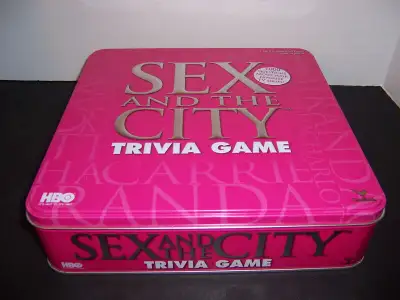 A 2004 SEX IN THE CITY TRIVIA GAME THIS HBO TRIVIA GAME COMES IN A DECORATIVE METAL/TIN LIDDED BOX....