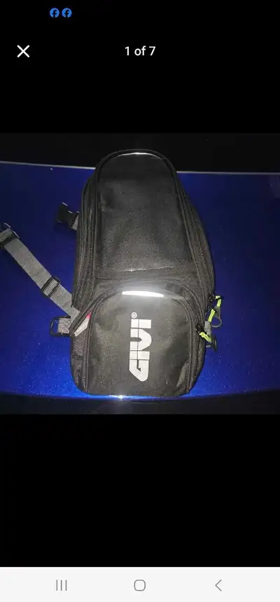 Great Condition. Used once not a good fit for my bike My loss you're gain. Has Magnets for tanks.