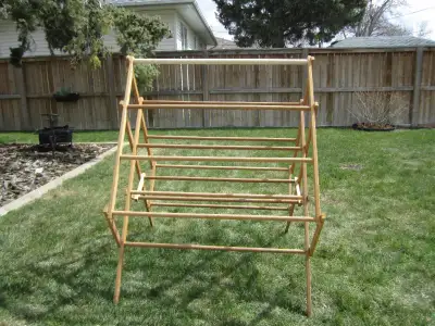 Wood Frame drying clothes rack. Good condition.$35.00.
