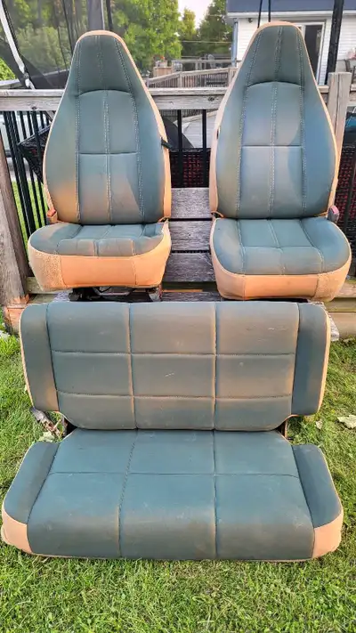 Set of 3 TJ Green/Tan Sahara seats from a 98 TJ Sahara. Driver seat has some foam degradation at ent...