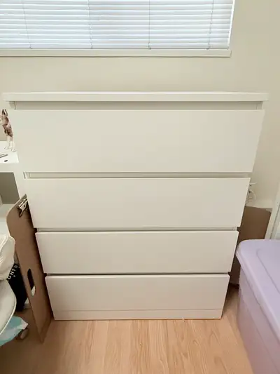 IKEA dresser in perfect condition except for a small mark on the top that can only be seen in certai...