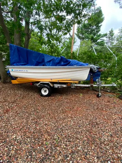 This Walker Bay WB-10F boat and trailer package is in good condition and ready for your next water a...