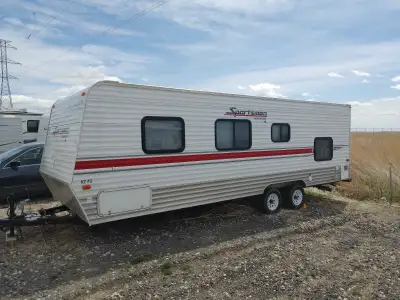24' KZ Sportsmen travel trailer. This trailer has one queen size bed, 2 bunks; In addition, sofa and...