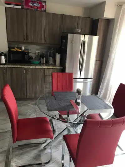 Round glass kitchen table with four chairs, View more