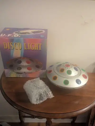 Get ready to boogie with this pre-owned UFO Disco Light! This far-out party essential is in good con...
