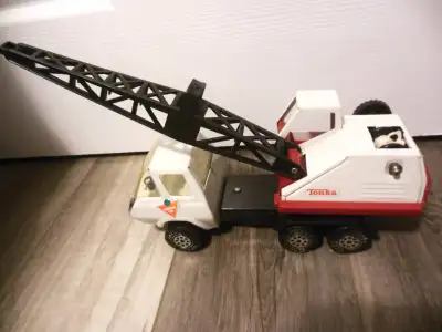 AN OBSCURE TOY, THIS TONKA CANADIAN TIRE CRANE LIFT TRUCK IS DEFINITELY A COLLECTOR'S ITEM. AS A VIN...