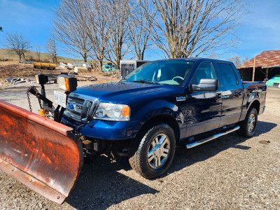 2008 Ford F150 with Plow