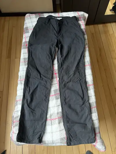 Black women's work pants. Relaxed fit. Multiple pockets. Durable canvas material. Size 2 short. Sell...
