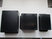 Three Plastic Electrical Box / Housing with Mounting Flanges.