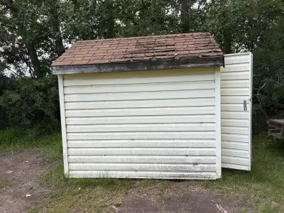 Garden shed 6’3” wide 8,3” long. Needs to have new siding on the one side