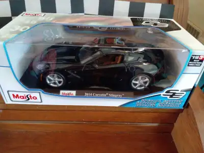 1:18 2014 Chevrolet Corvette Stingray Made by Maisto Mint N.I.B condition Highly desirable black wit...