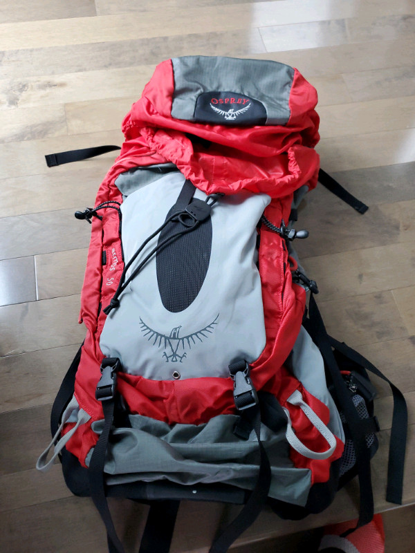 BRAND NEW - NEVER USED - Osprey Atmos 50 Backpack - L - Red! in Fishing, Camping & Outdoors in Ottawa