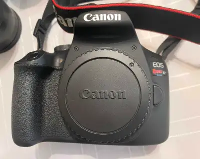 Canon T7 Camera Kit comes with: Cannon T7 DSLR camera body and strap EFS 18-55mm 1:3.5-5.6 IS II EF...