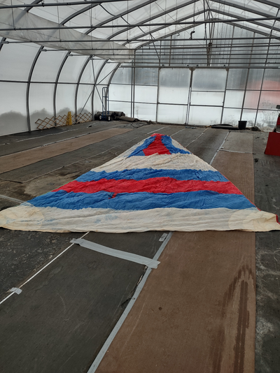 Old spinnaker. Approximately 26 feet on the luff. Has a coupe taped patches. Has not been used in ma...