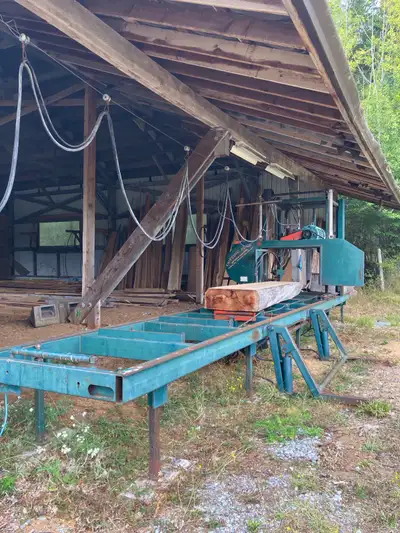 Sawmill from estate , 20kw 3phase 480 volt diesel generator , 20HP electric motor c/w hyd feed contr...