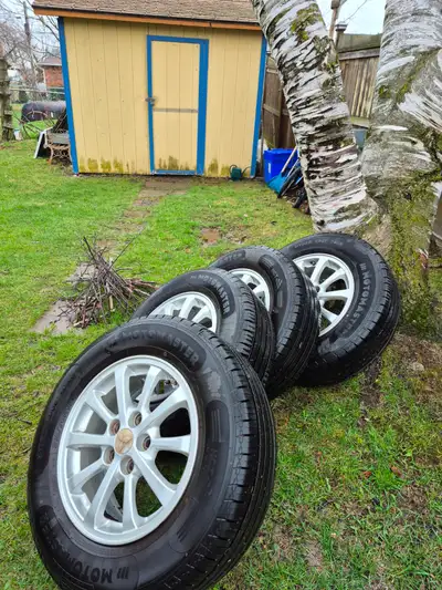 Tires on rim From 2012 Mitsubishi RVR. All season tires on aluminum rim used for 5 months and 2 of w...