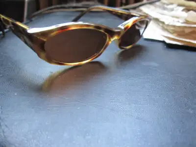 Selling a rare hard to find high quality pair of Arnette sunglasses model name Mantis 125-6702 made...