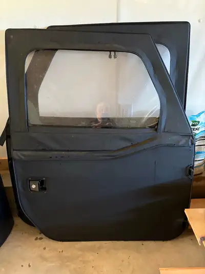 Jeep JK soft doors and hanging bracket. Get ready for summer with these doors. Sold the Jeep now sel...