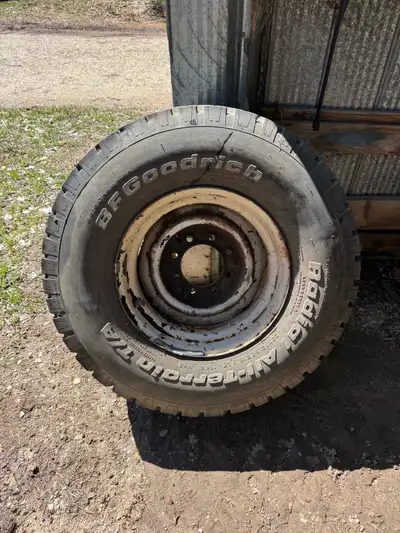 Not sure the exact year there for but 4 tires and rims 8 bolt ford ( maybe off an old van ? ) BEST O...