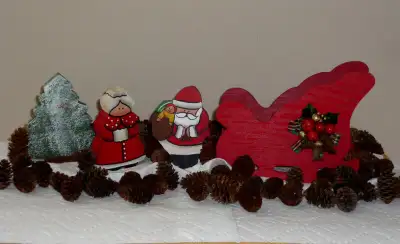 As shown in pictures ... Wooden Christmas Santa, Mrs. Clause, Sleigh, Mini Pinecones and Tree ... Cl...