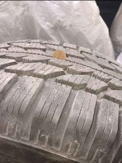Firestone Winter Force 2 winter tires (set of 4). Comes with metal rims. Good quality and performs w...