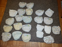 21 Kushies brand cloth diapers w. built in plastic pants
