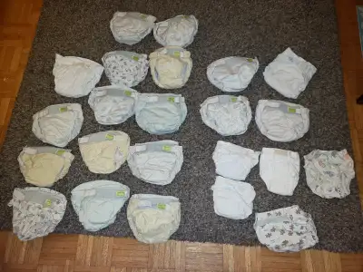 21 Kushies brand cloth diapers w. built in plastic pants, View more