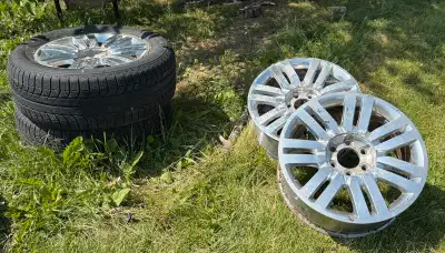 4 wheels from a Lincoln Navigator Would fit ford f150 2 with Michelin X ice tires 2 wheels in decent...