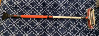 Brand new premium telescoping automotive snow brush with added scraper and squeegee. Scraper is also...