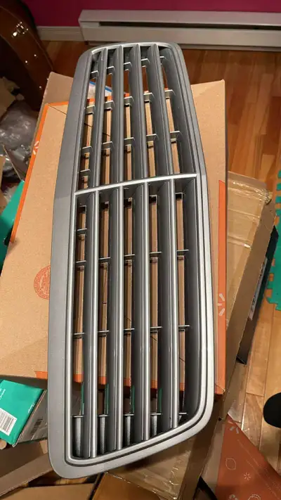 Great condition. The grill was painted years ago the same color as the car. Silver. Fits CLK 320/430...